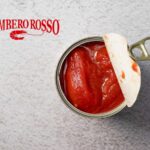 barattolo pomodori pelati e logo gambero rosso